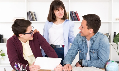Three Young University graduates enjoying their time while studying
