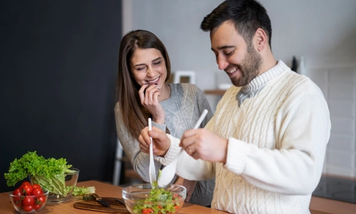 Family preparing food together at home