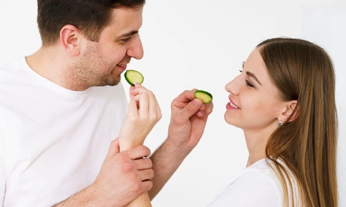 Couple feeding each other while spending quality time together
