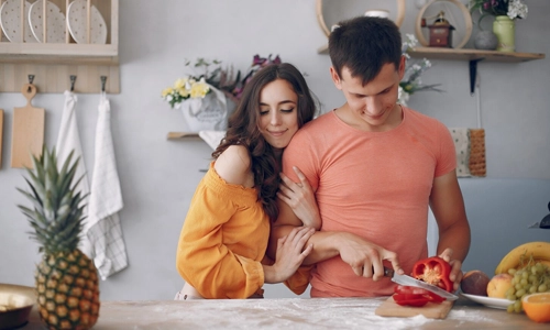 Couple preparing a meal together in the kitchen
