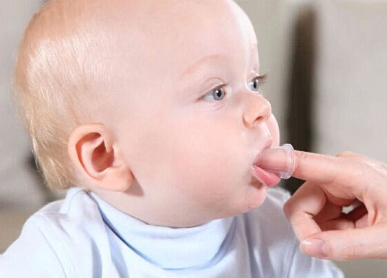 Help Child by Rubbing Gums
