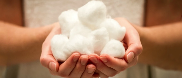Image of cotton balls in hand