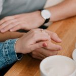 Holding spouse hands