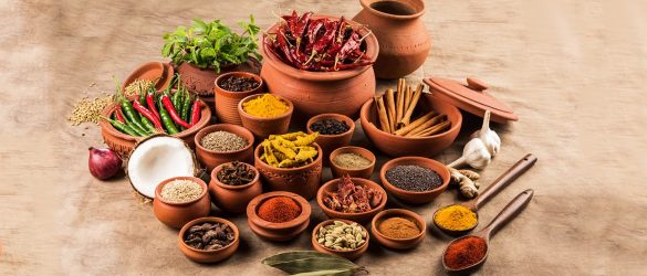 Different spices arranged in mud vessels