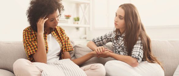 A girl helping her friend who is going through a recent breakup