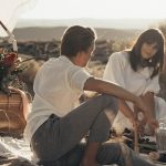a couple talking about their upcoming honeymoon