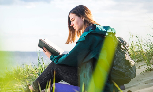 A-woman-is-reading-a-book